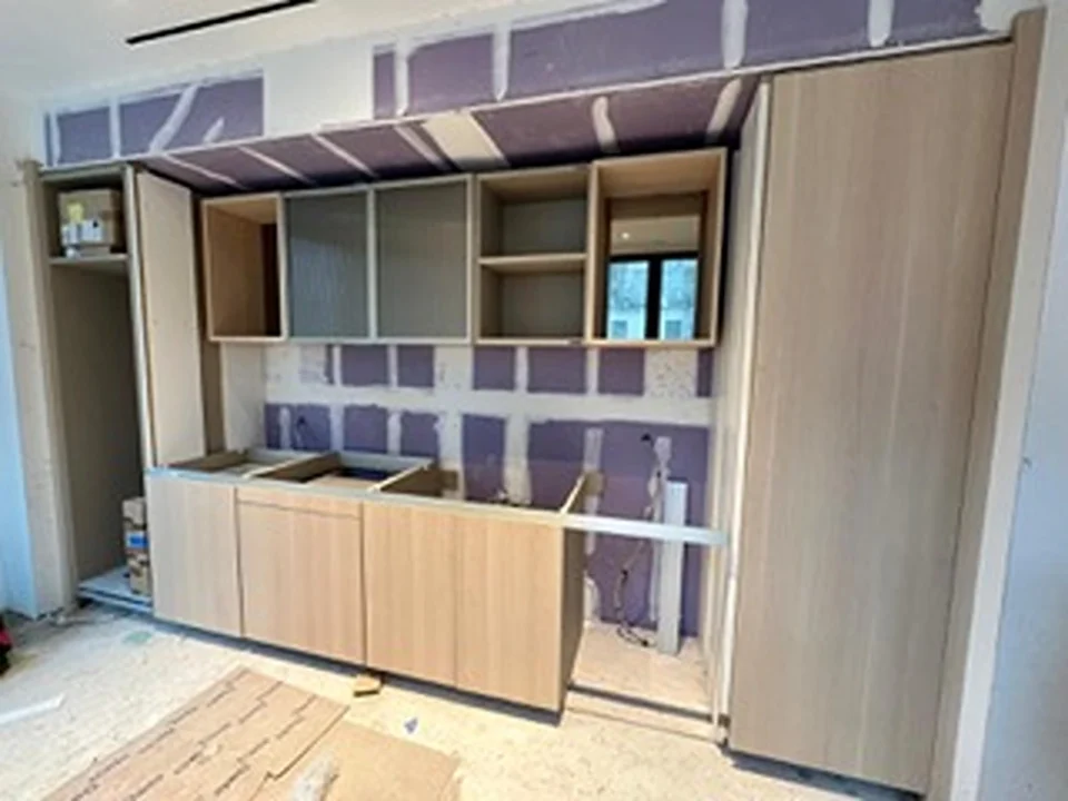 a kitchen cabinets in a room