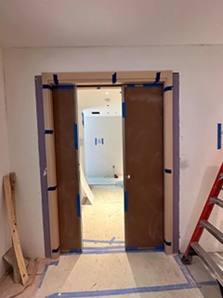 a door with blue tape around it