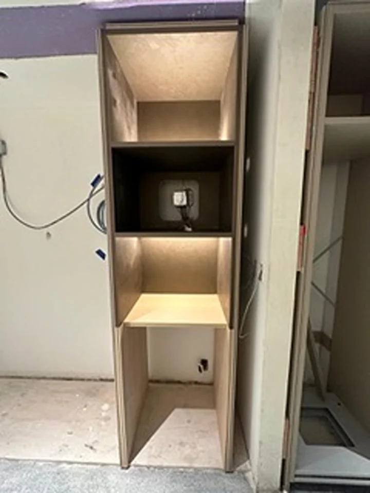 a shelf with lights on it