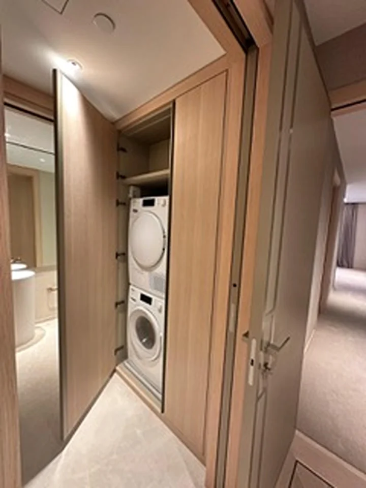 a washer and dryer in a closet