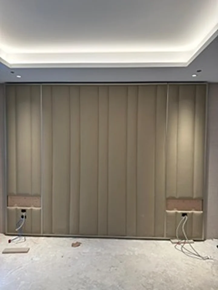 a wall with wires and lights