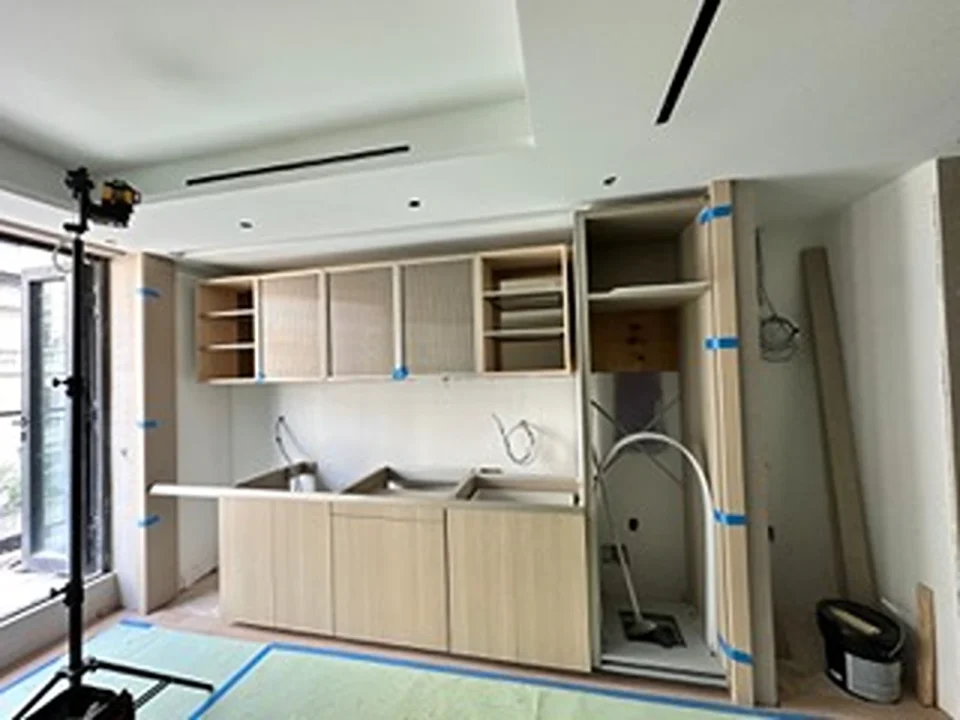 a kitchen under construction in a room