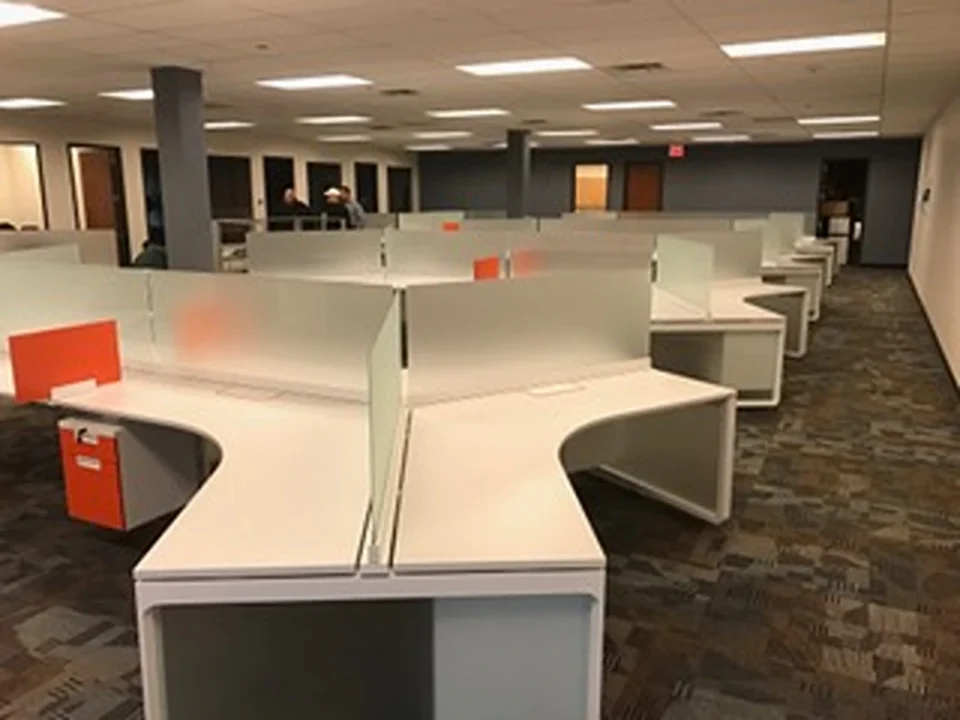 a group of cubicles in an office