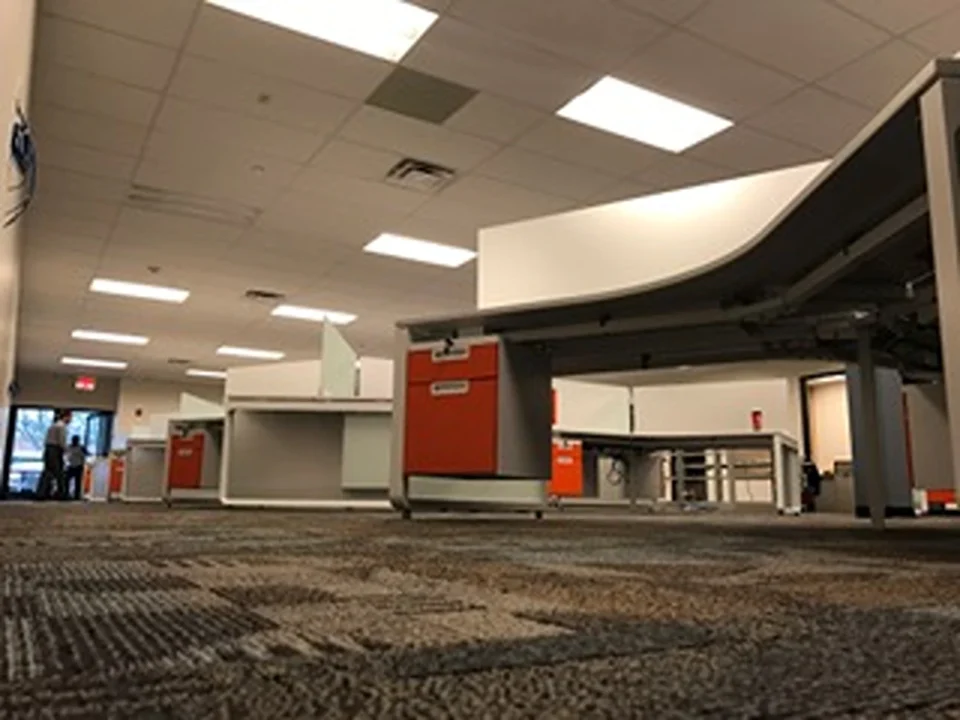 an empty office with a few cubicles