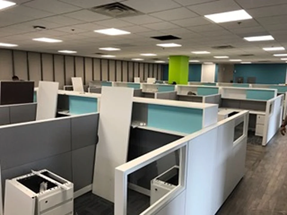 an office cubicles with white and blue walls