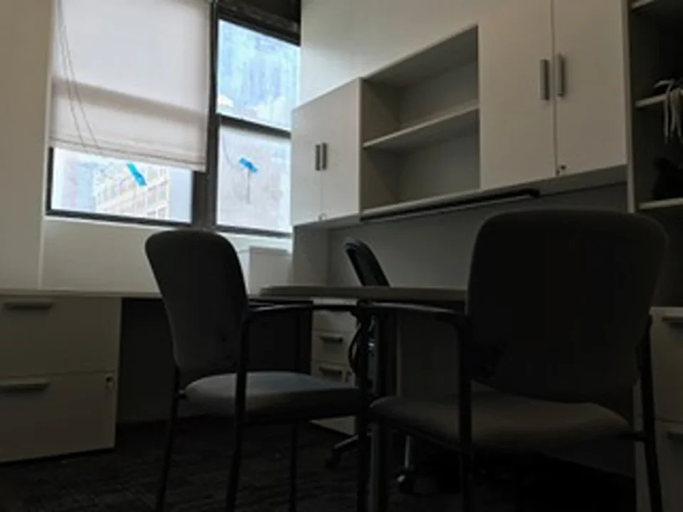 a chair and desk in an office