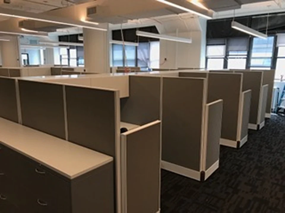 an office cubicles with a few cubicles