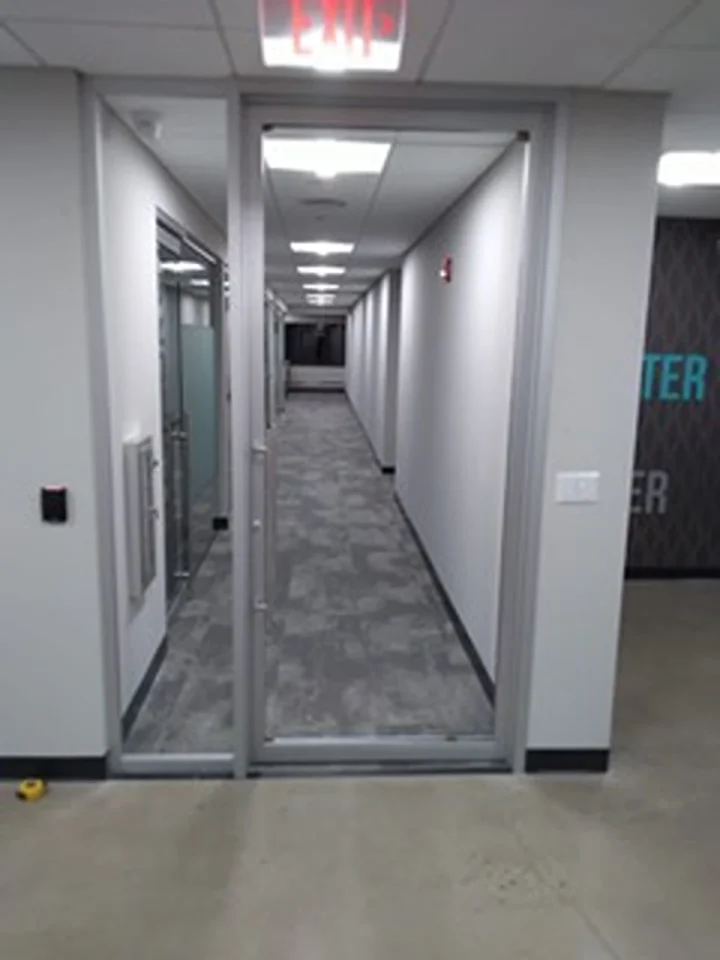 a hallway with glass doors