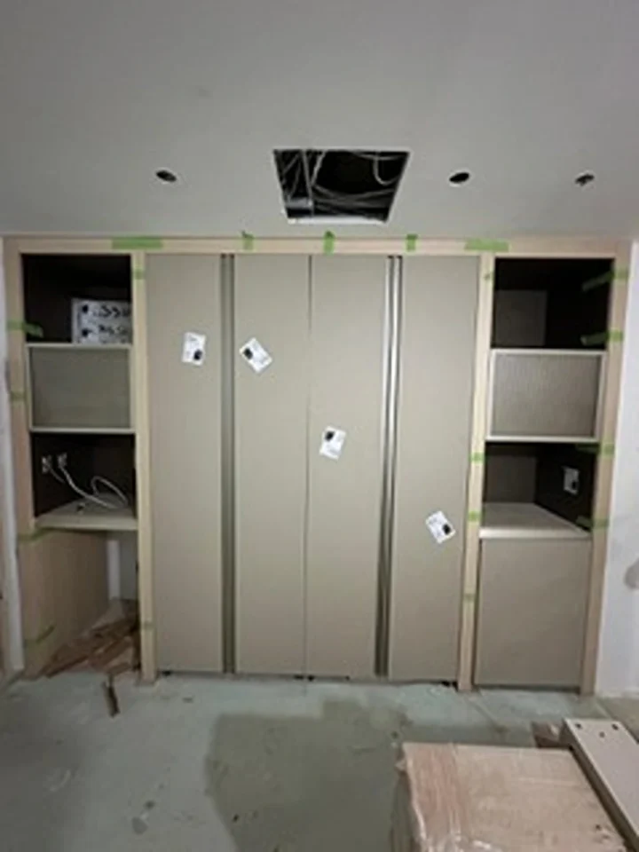a room with cabinets and shelves
