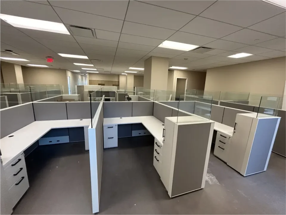 an office cubicles with glass walls