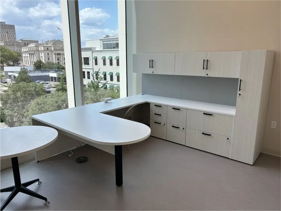 a white office with a large window
