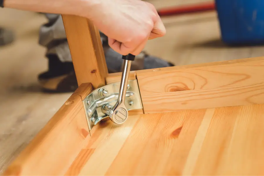 a hand holding a tool