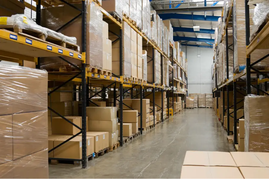 a warehouse with boxes on shelves