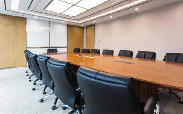 a conference room with chairs and a table