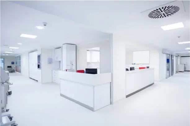 a white room with white walls and a white counter